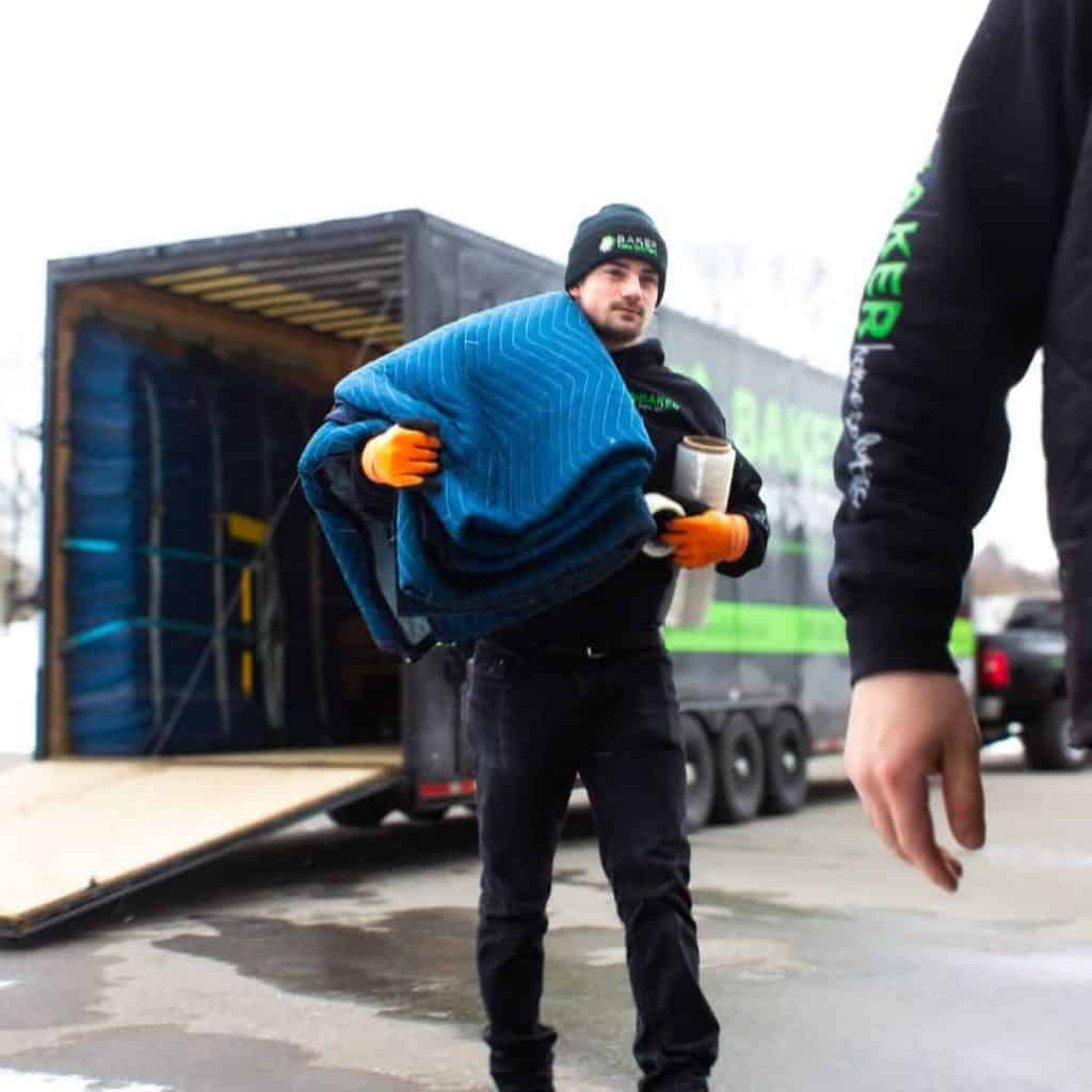 Loading construction materials into a truck for home renovation.