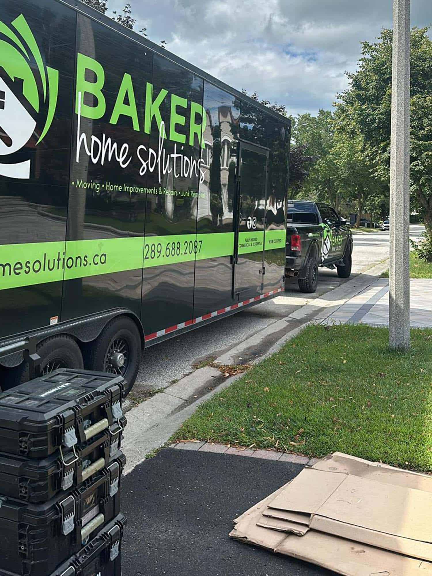 Moving truck with Baker Home Solutions branding for home improvement and repair services.