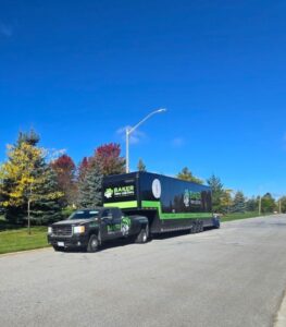 Baker Home Solutions branded truck offering home services in a suburban neighborhood, showcasing reliability and professionalism.