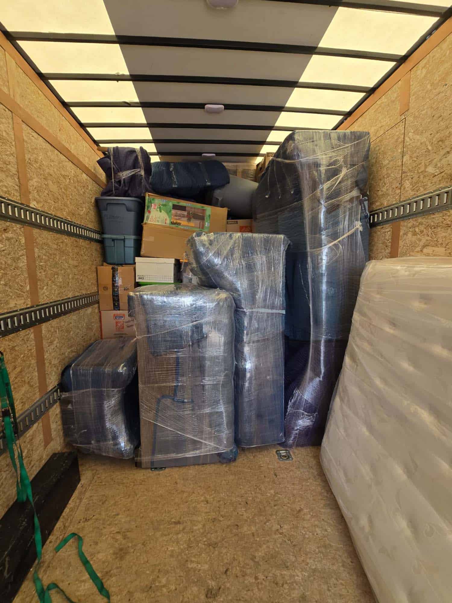 Moving and storage supplies packed in a truck for delivery or storage.